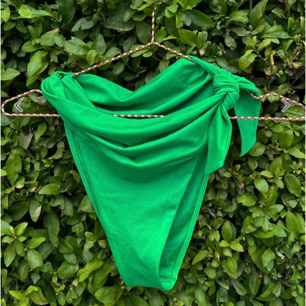 We are HAH bikini, green. Size M bottom, size S top. Selling as a set. NWT